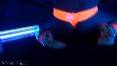 Madden teases topless in black light Thumb