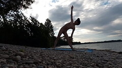Slender nudist boy does yoga nude on a naturist beach. Naked yoga video by Jon Arteen gay porn model Thumb